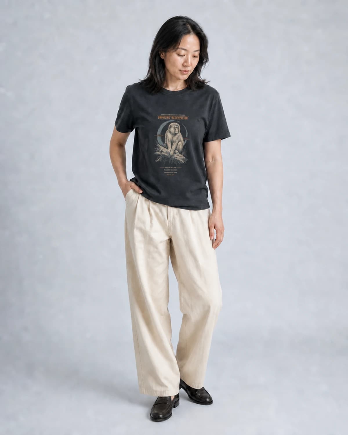 Adult wearing the Snowline Observation tee in Dark Grey