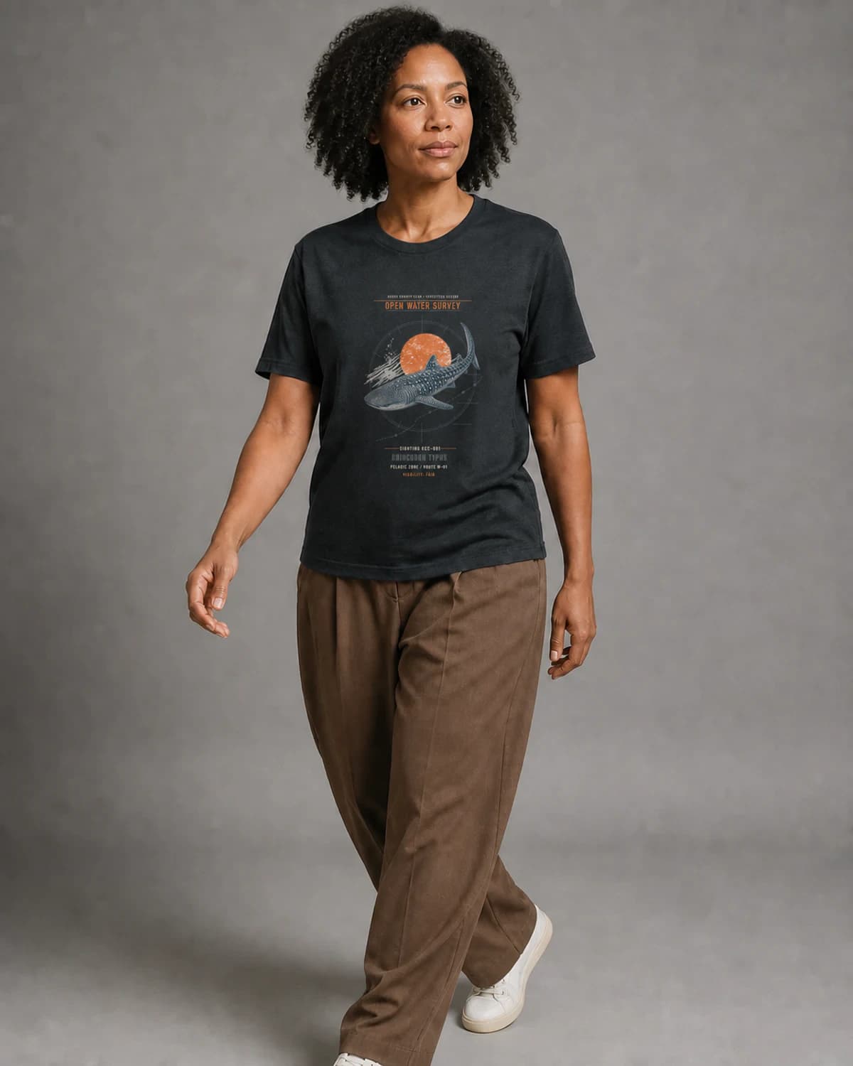 Adult wearing the Open Water Survey tee in Dark Grey