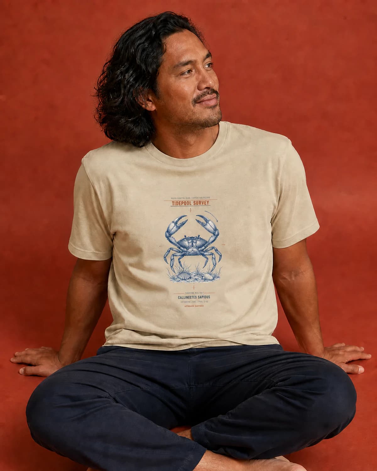 Adult wearing the Tidepool Survey tee in Soft Cream